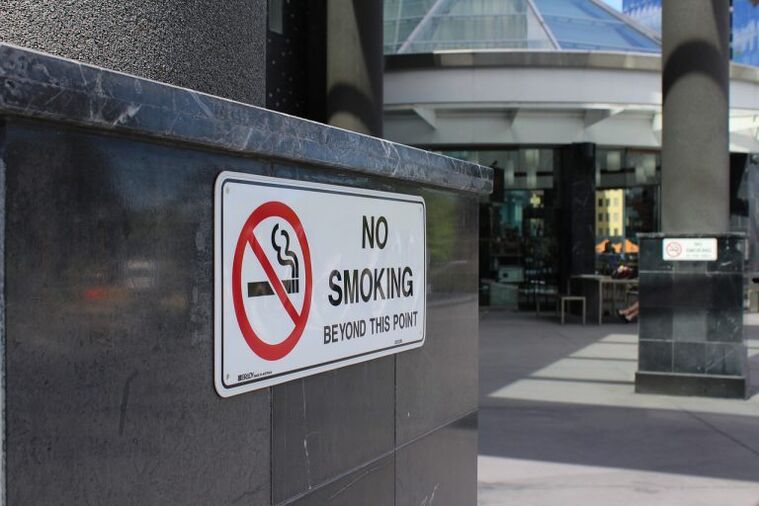 a ban on smoking in public places encourages smoking cessation